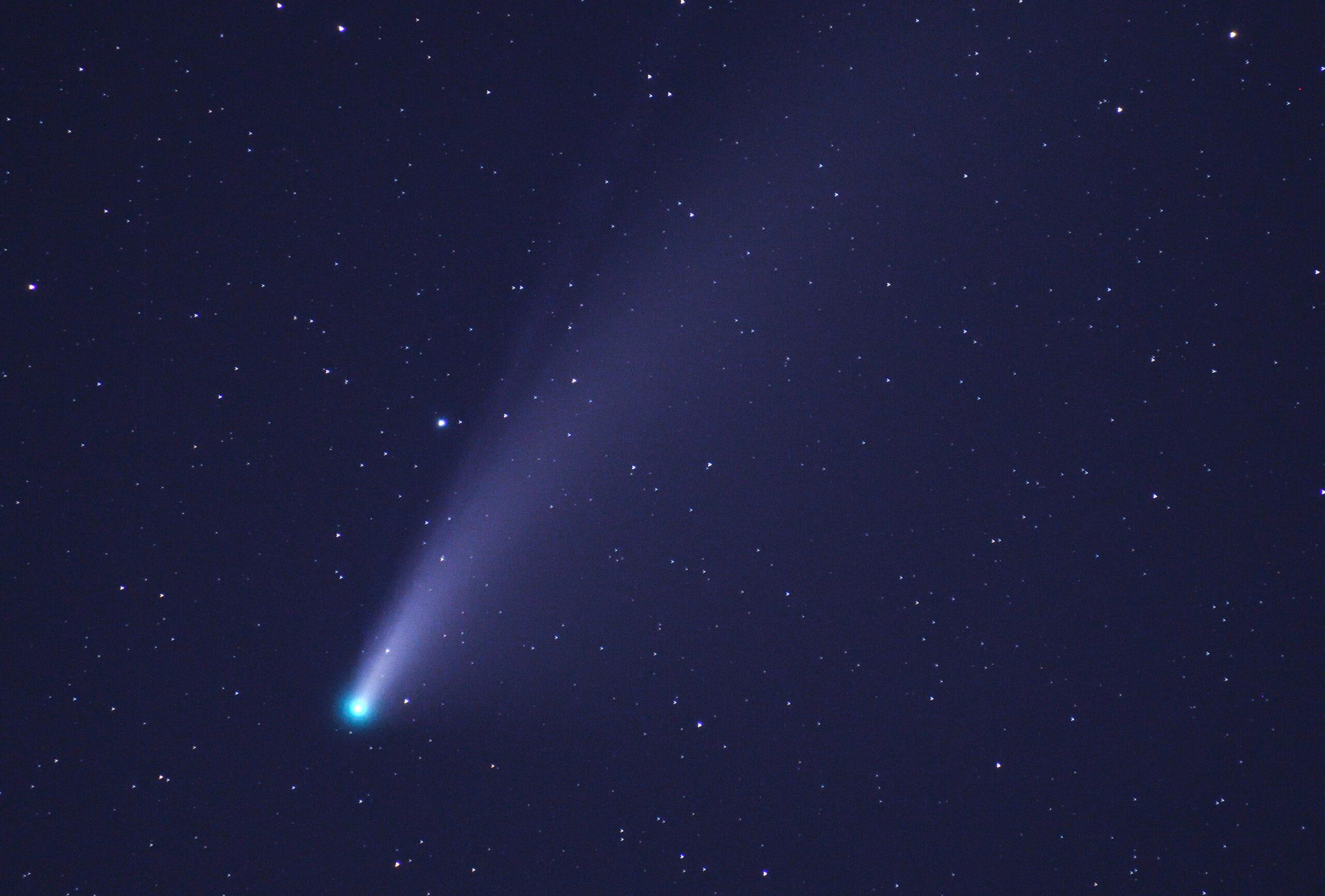 Meteor streaming across the night sky