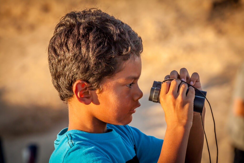 boy with binoculars